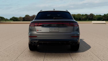 Rear profile of the Audi SQ8 parked.