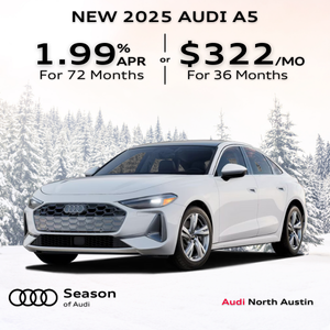 Side view of an Audi A5 parked.