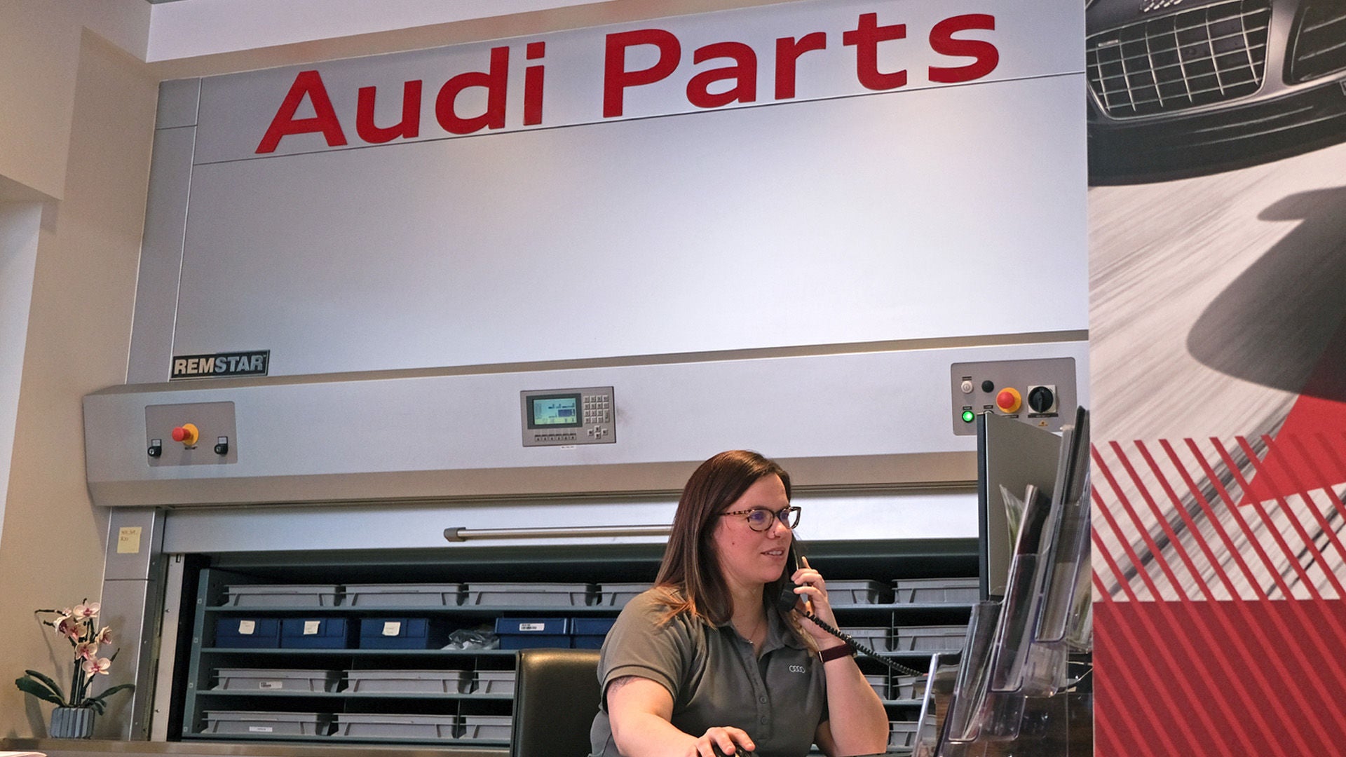 Audi Parts technician on phone