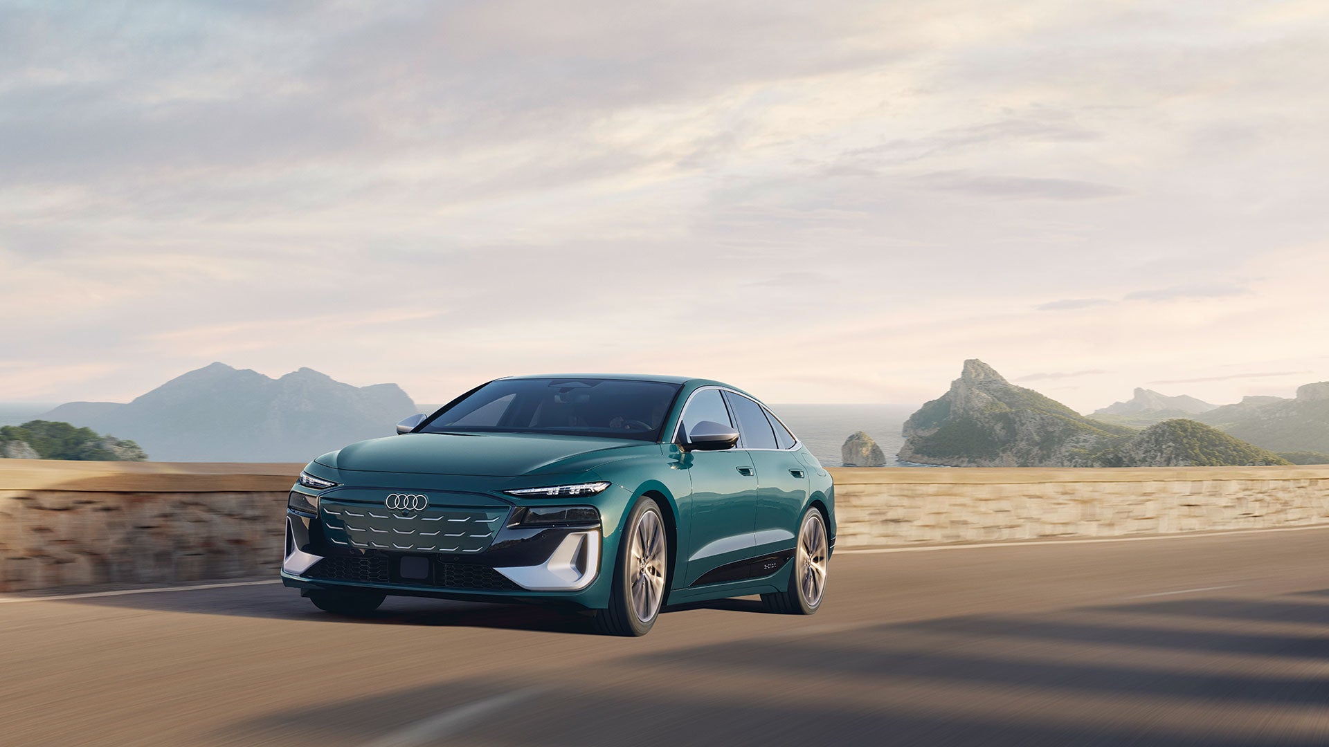 Three-quarter front view of the Audi S6 e-tron in motion.