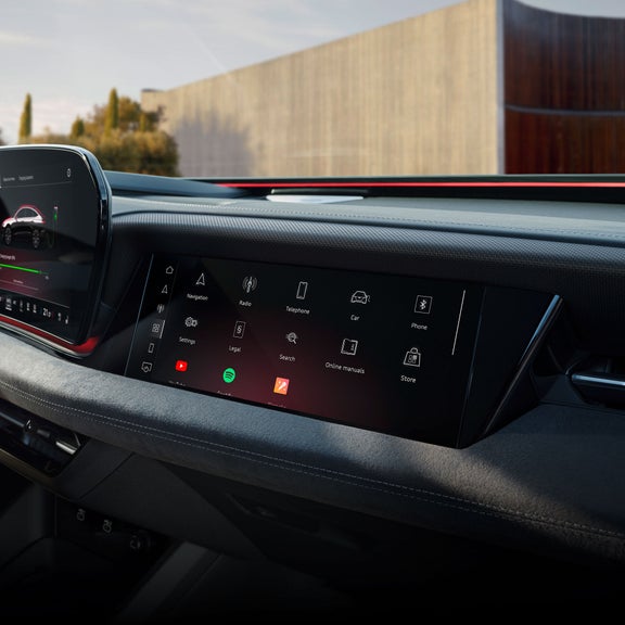 Close-up on the passenger display screen in the Audi S6 e-tron.