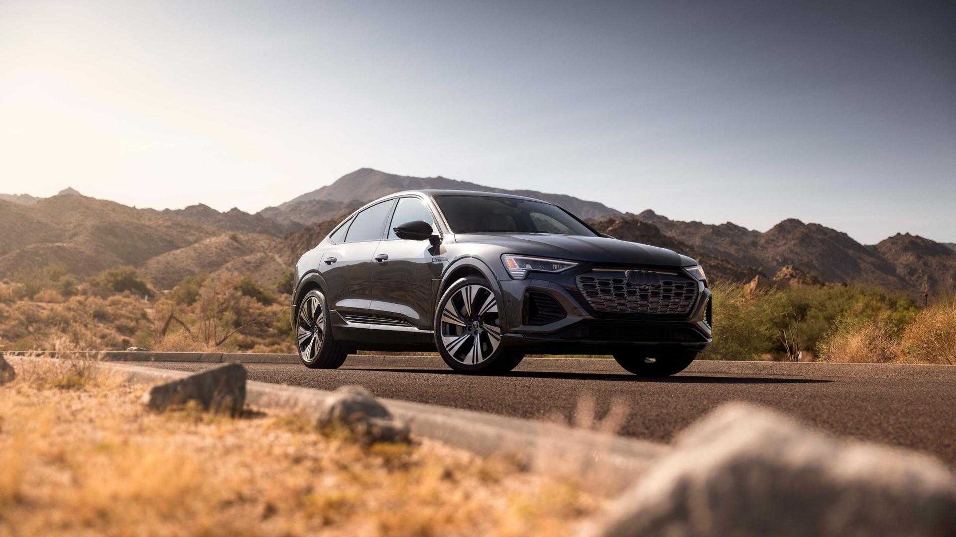 Right-profile view of an Audi Q8 e-tron parked.