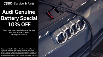 Service technician servicing a vehicle