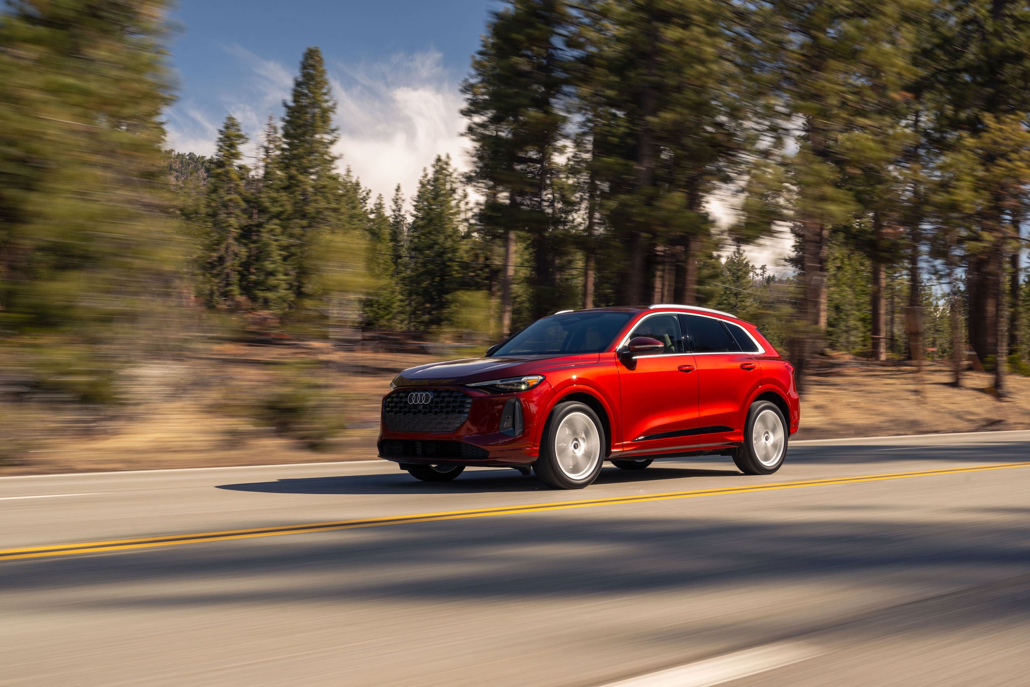 Audi finance specialist handing over keys to an Audi.
