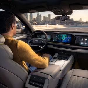 Driver using the hands free feature in an Audi SQ7.