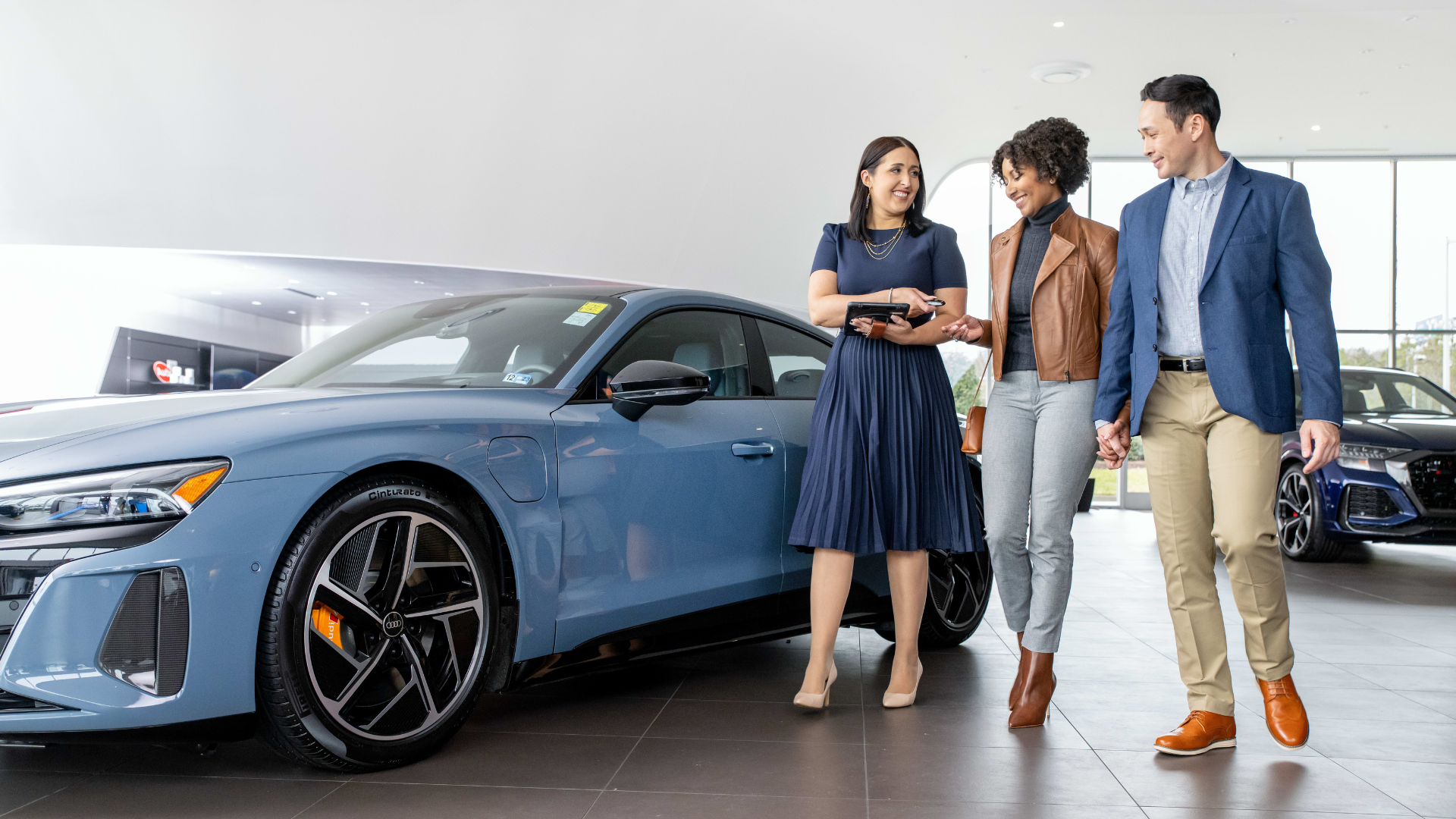 Audi representative consulting customers.