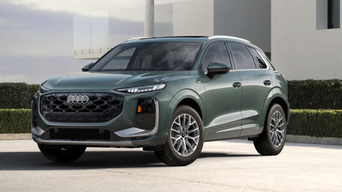 Three quarter profile view of an Audi Q3 parked.