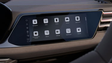 View of the interior cabin of the Audi S5, showing the passenger display screen and the dashboard.