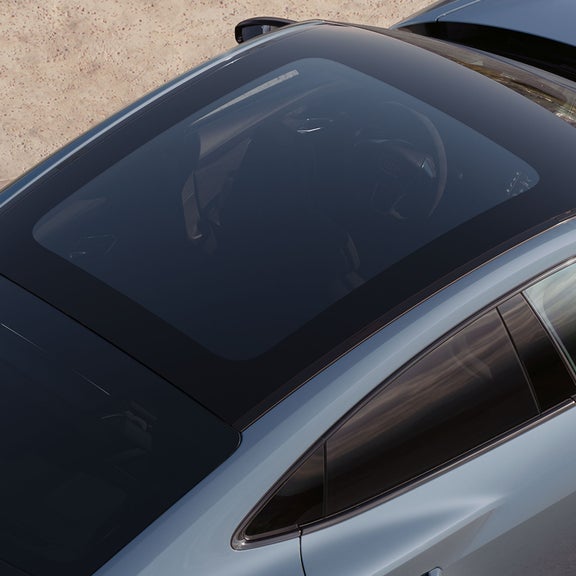 Close up aerial shot of the panoramic roof of the Audi S e-tron GT. 