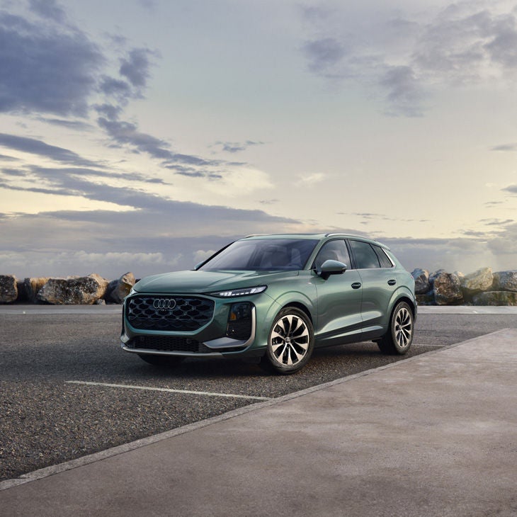 Three-quarter front view of the Audi Q3 parked.