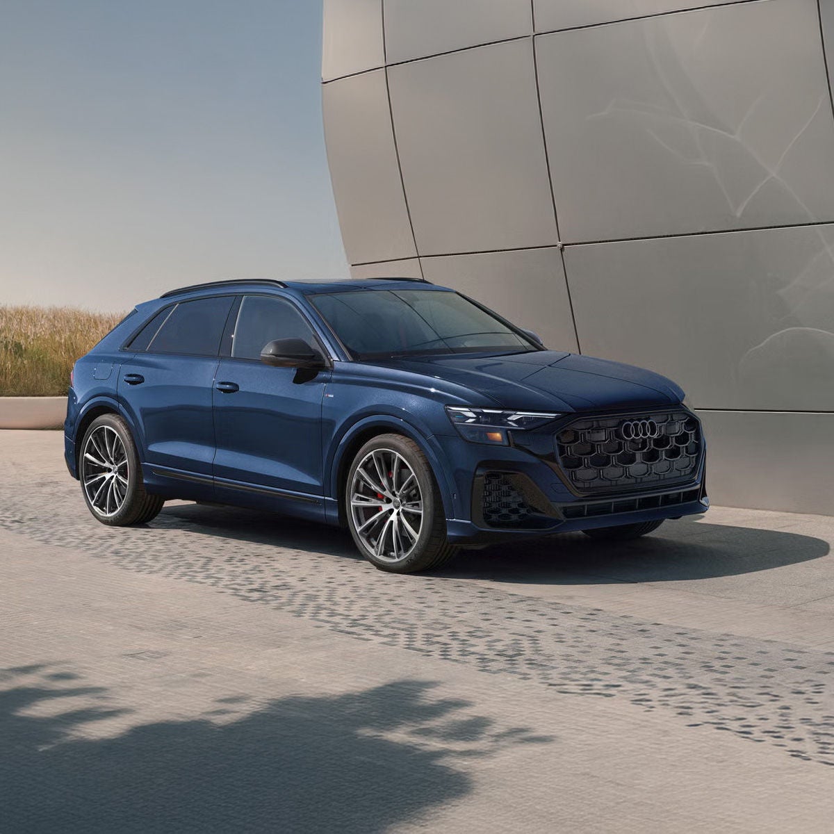 Three quarter front view of the Audi Q8. 