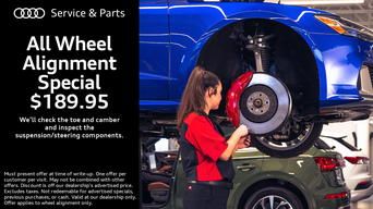 Service technician inspecting a vehicle.