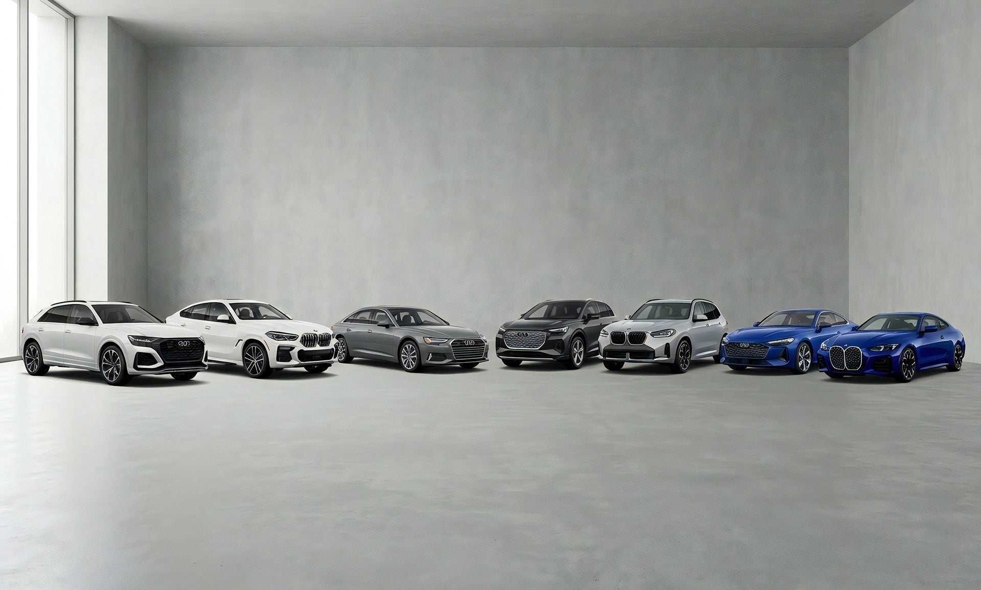 Audi vs BMW lineups parked next to each other in a grey room
