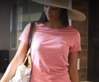 Woman wearing Audi Collection. 