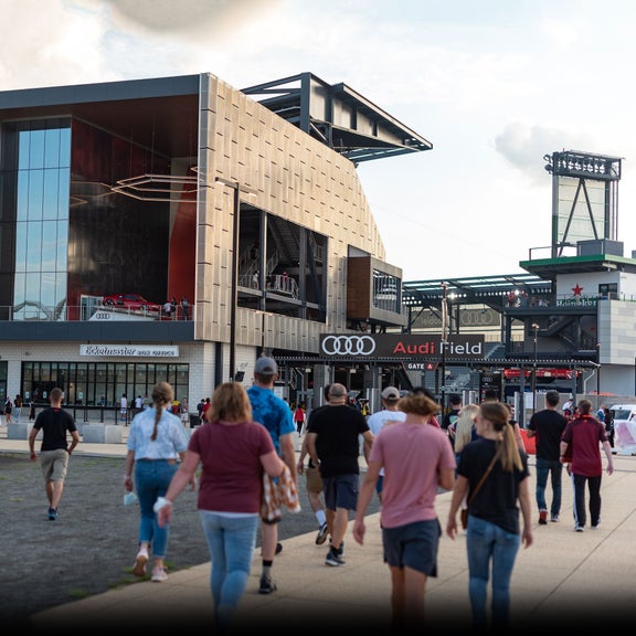 Event attendees approaching the gate at Audi Field.