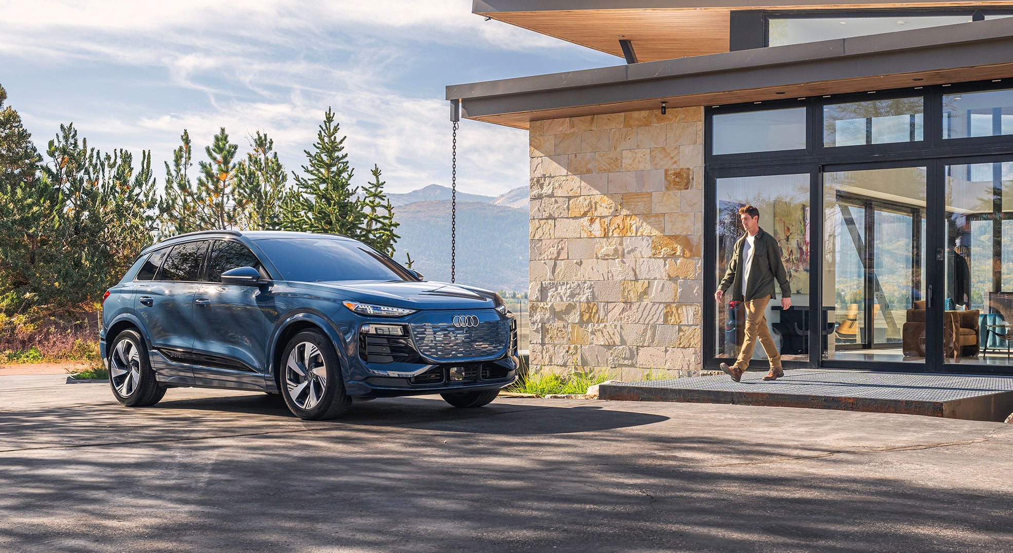 Man walking to his Audi