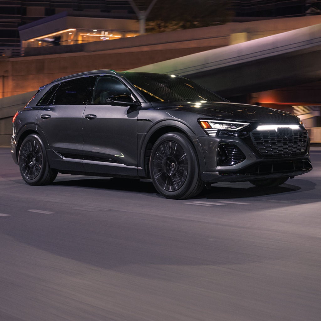 Right profile view of an Audi Q8 e-tron parked.