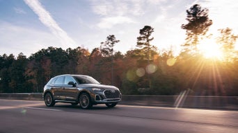 Right side view of an Audi Q5 vehicle accelerating