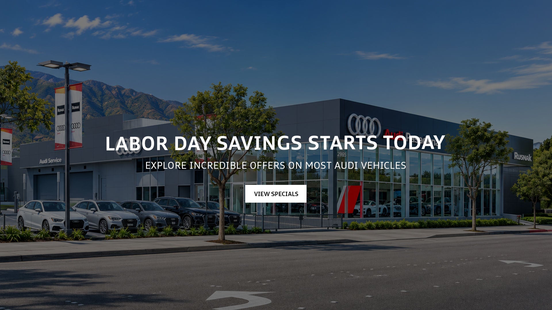 Photo of Audi Pasadena Dealership during a summer day