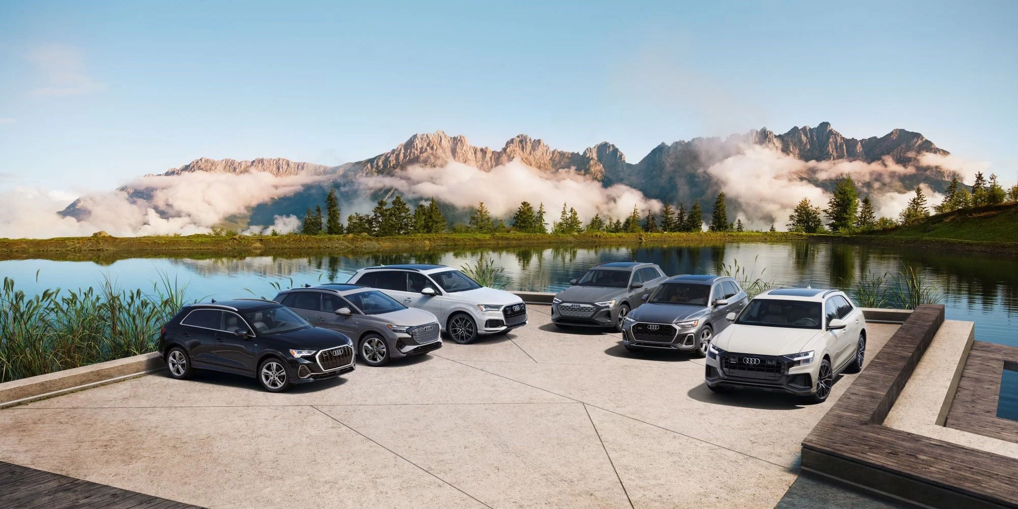 Lineup of Audi SUVs at a distance
