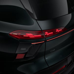 Close-up of the curved left OLED taillight on the Audi Q9.