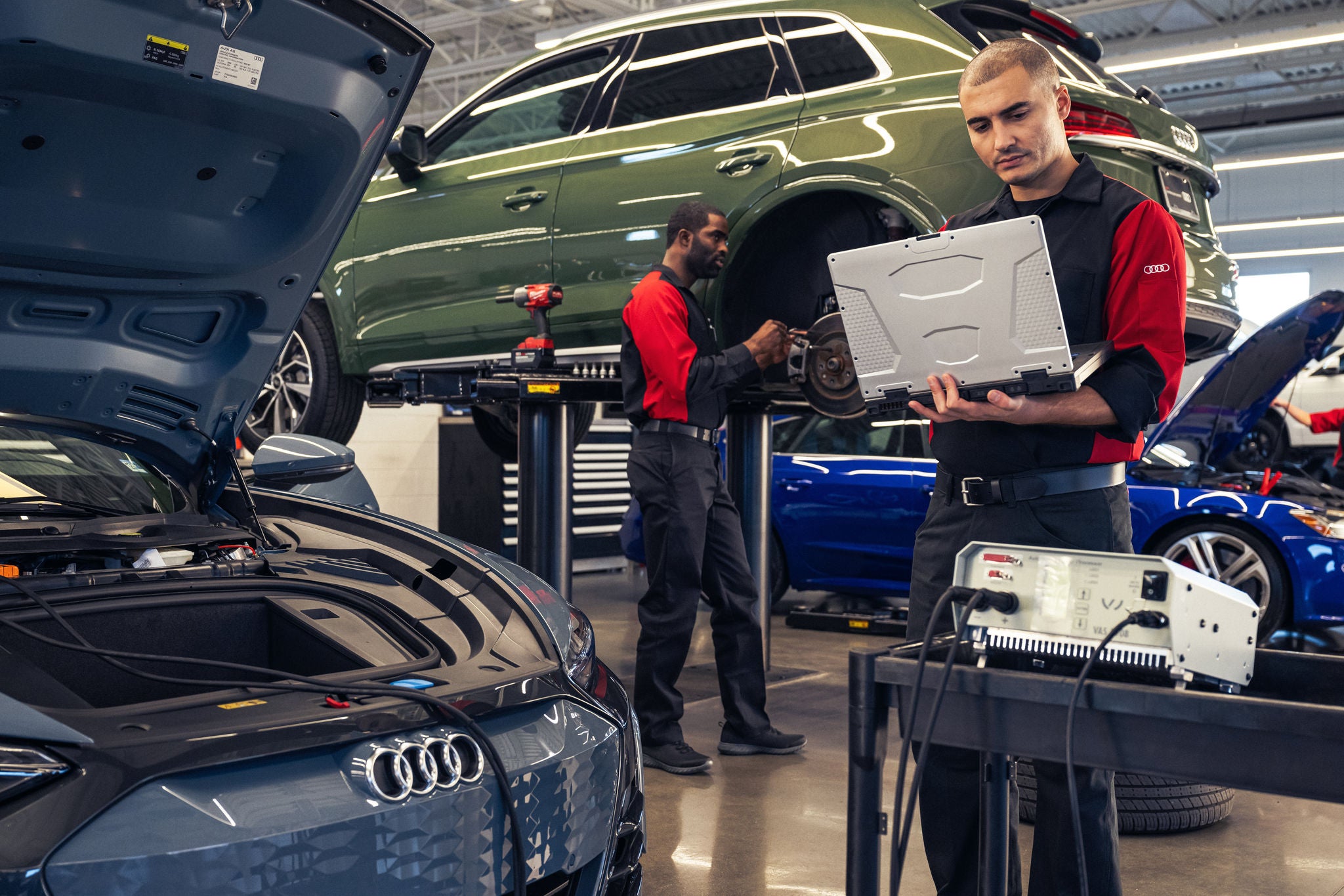 Audi tech working in the service bay