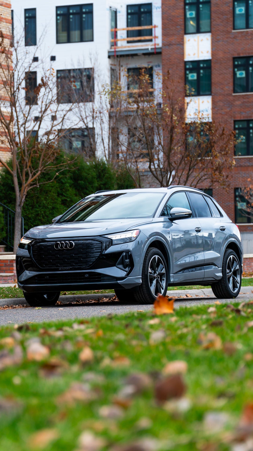 Profile view of an Audi vehicle accelerating.