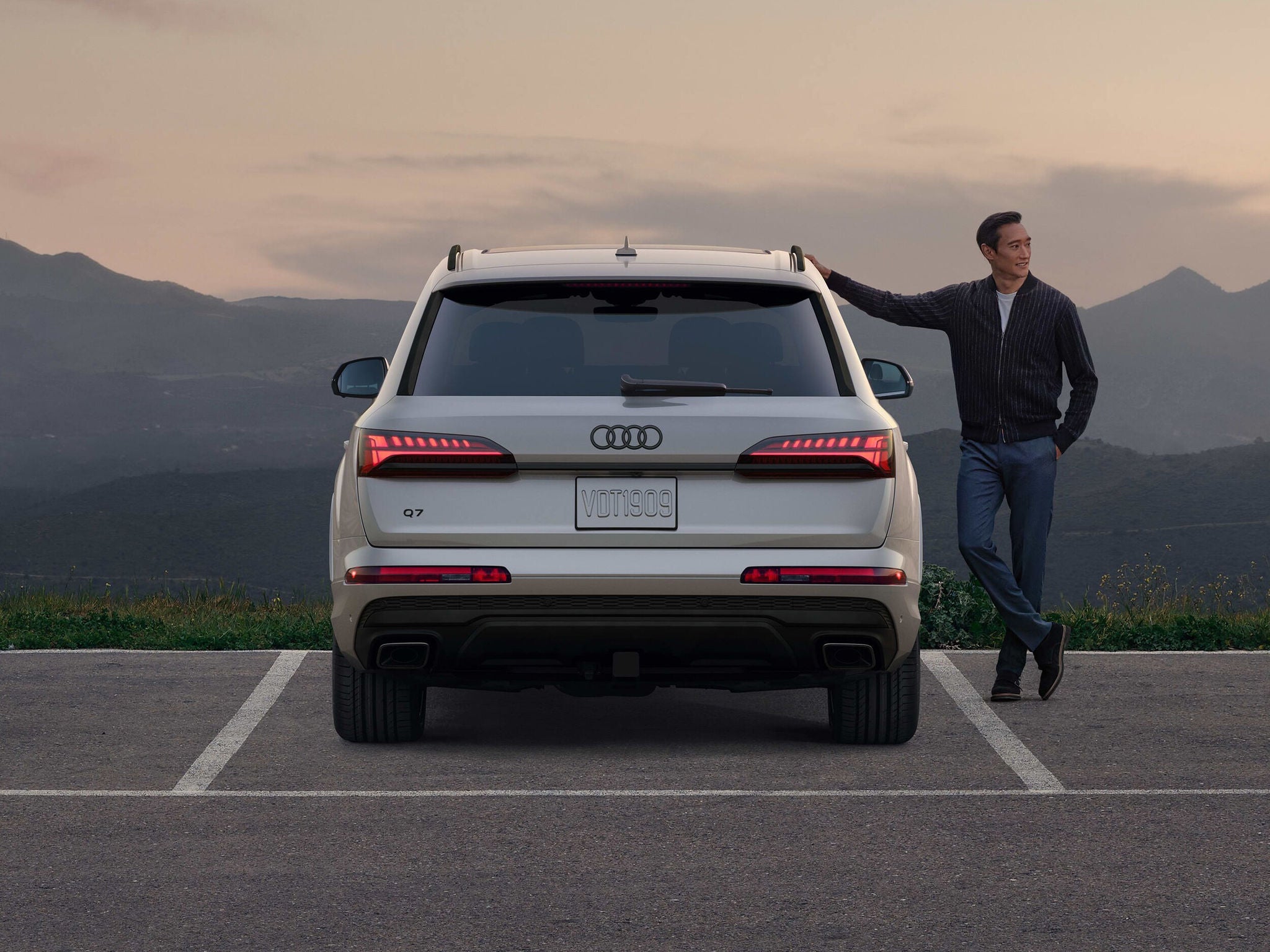 Rear View of New 2025 Audi Q7 with Owner