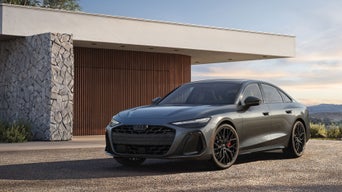 Three-quarter front view of the Audi A6 Sedan.