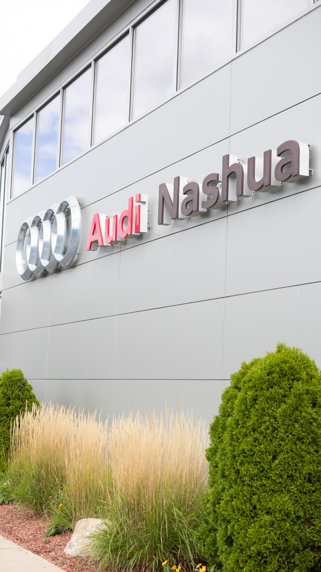 View of an Audi Nashua dealership.        