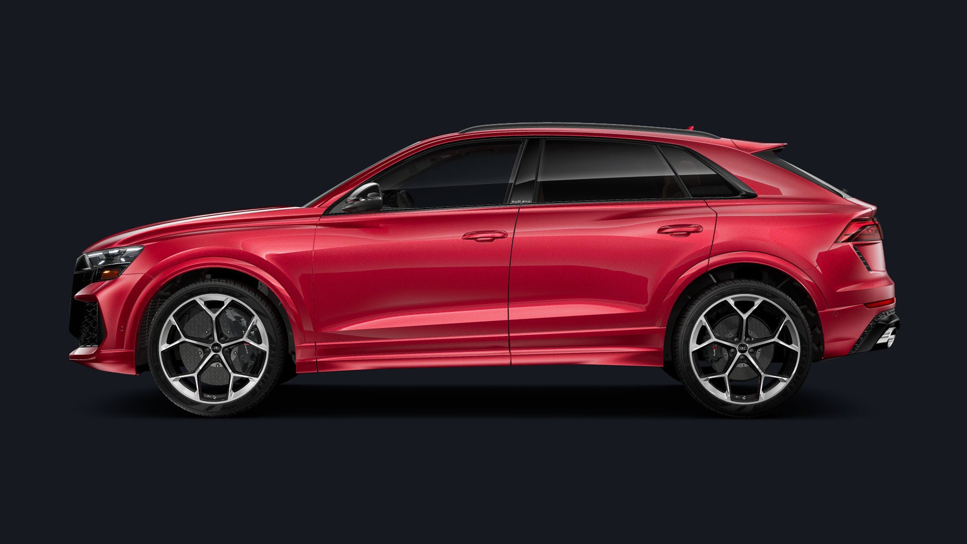 Side-view of a red Audi RS Q8.