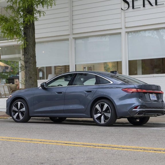 2026 Audi A5 Sportback rear three quarter parked city at Audi Sewickley near Pittsburgh PA