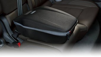 Depiction of the Audi rear seat box in use.
