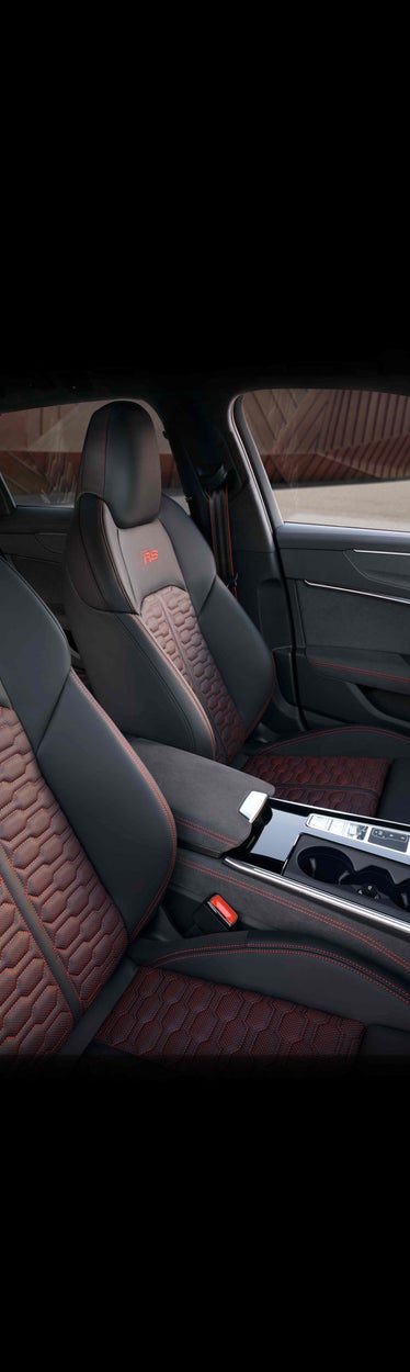 Interior shot of the cockpit and dashboard of an Audi. 