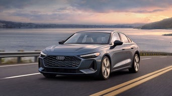 Front side view of the 2025 All New Audi A5 sedan driving.