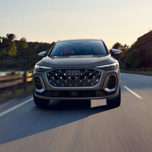 Front shot of the Audi SQ5 accelerating on highway.