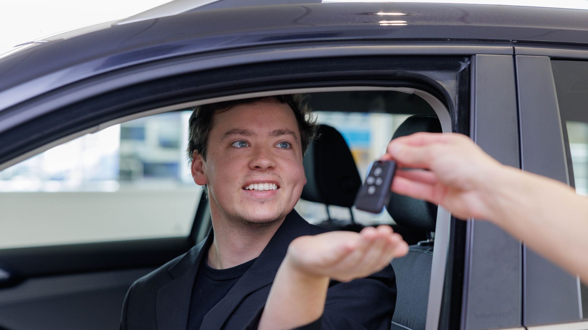 Audi sales technician working with a customer.