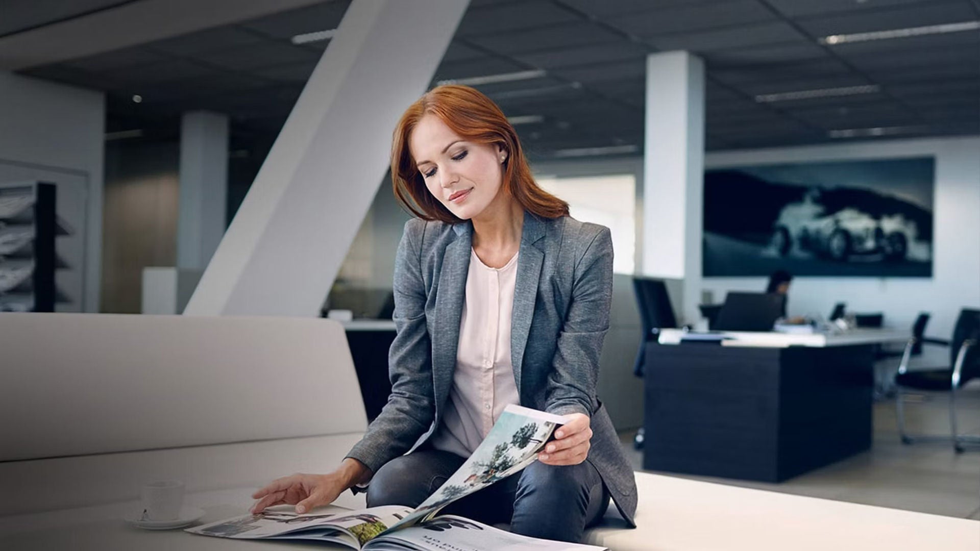 Audi service technician servicing a vehicle.