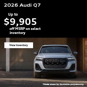 Back view of an Audi SQ7 accelerating.