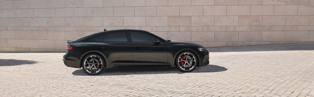 Side view of an Audi S5 parked in driveway