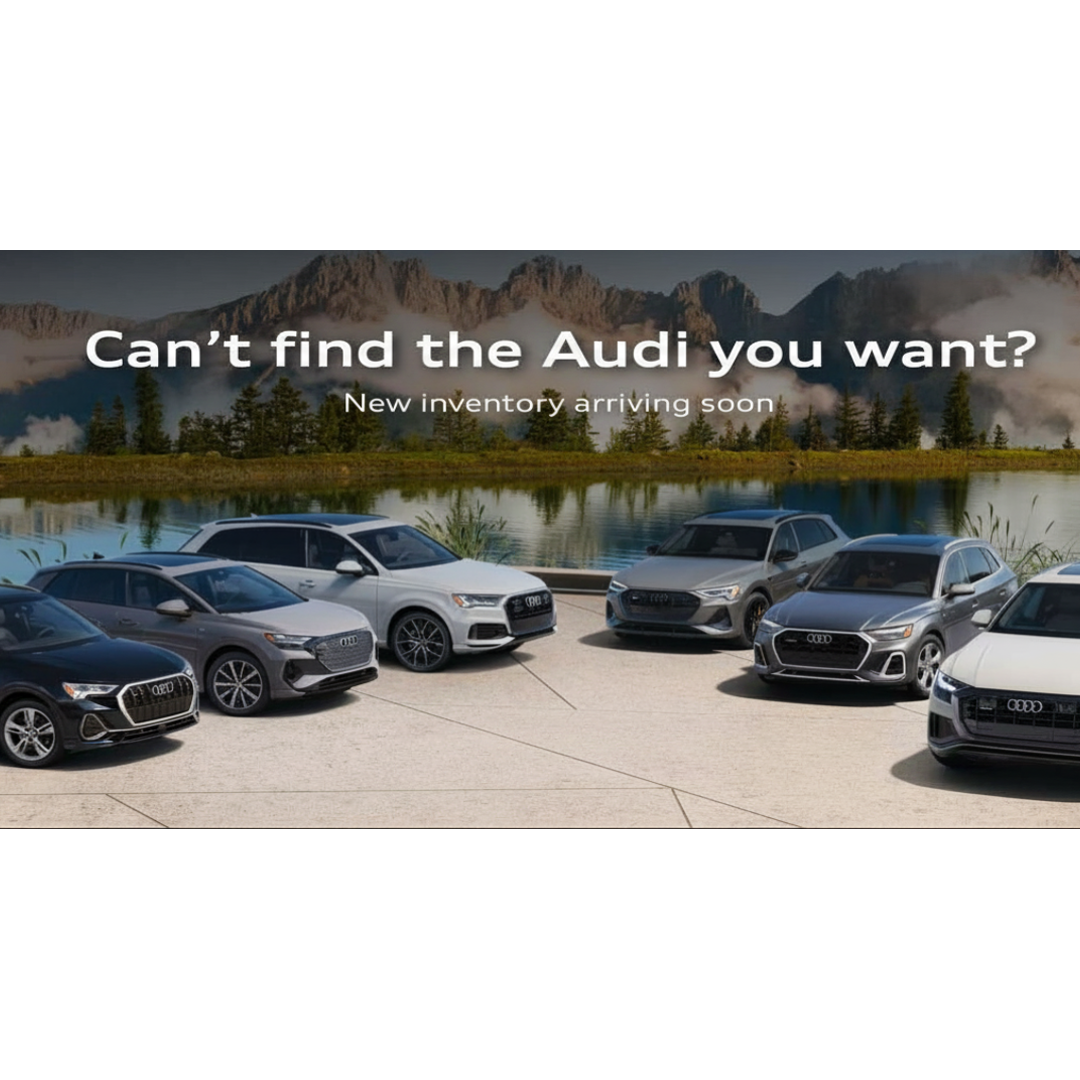 Audi car lineup parked with scenic mountain background showcasing luxury design