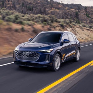 Front view on an Audi Q5 driving.