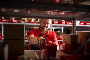 Car Battery held by Audi Technician