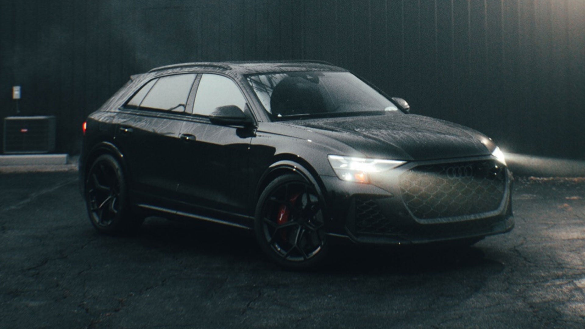 Left profile view of an Audi q8 vehicle parked.