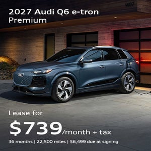 front facing 2027 Audi Q6 e-tron Premium driving
