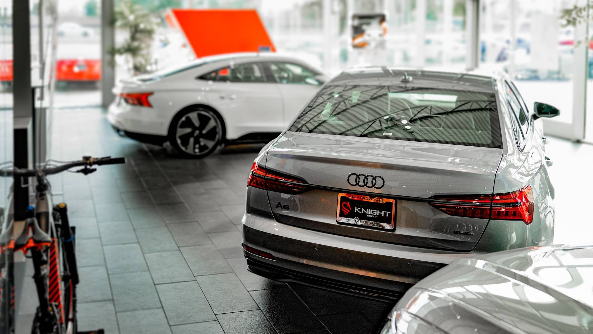 Audi vehicles in showroom.