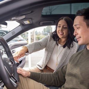 Couple beginning an Audi test drive — schedule yours at Audi Sewickley near Pittsburgh