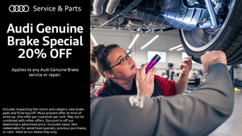 Service technician inspecting a vehicle.