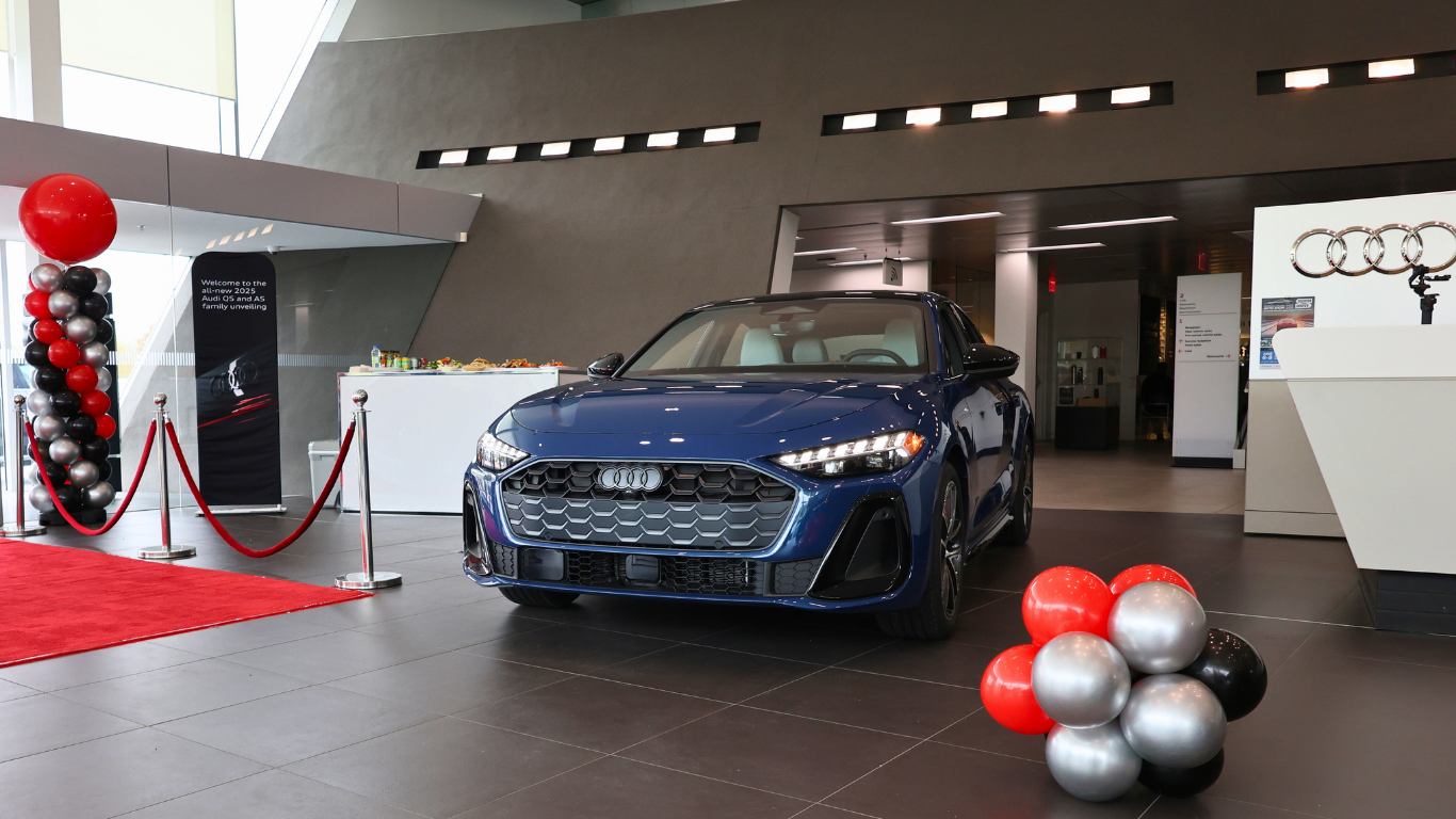 Left profile view of an Audi q8 vehicle parked.