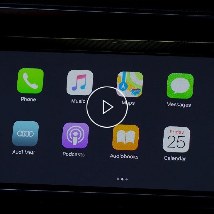  Close-up photo of the MMI screen in an Audi displaying the Apple Carplay screen.